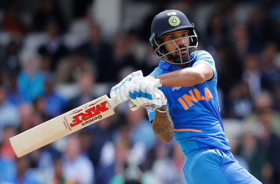 India's Shikhar Dhawan plays a shot during the 2019 Cricket World Cup group stage match between India and Australia at The Oval in London on June 9, 2019. (Photo by Adrian DENNIS / AFP) / RESTRICTED TO EDITORIAL USE        (Photo credit should read ADRIAN DENNIS/AFP/Getty Images)