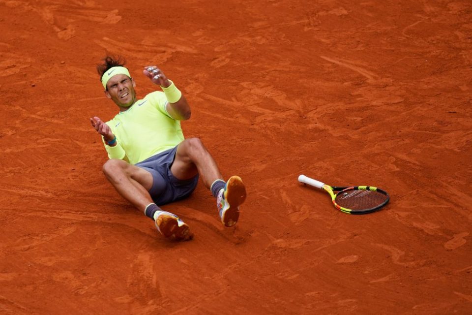 TOPSHOT - Spain's Rafael Nadal celebrates after winning against Austria's Dominic Thiem during their men's singles final match, on day fifteen of The Roland Garros 2019 French Open tennis tournament in Paris on June 9, 2019. (Photo by Kenzo TRIBOUILLARD / AFP)        (Photo credit should read KENZO TRIBOUILLARD/AFP/Getty Images)