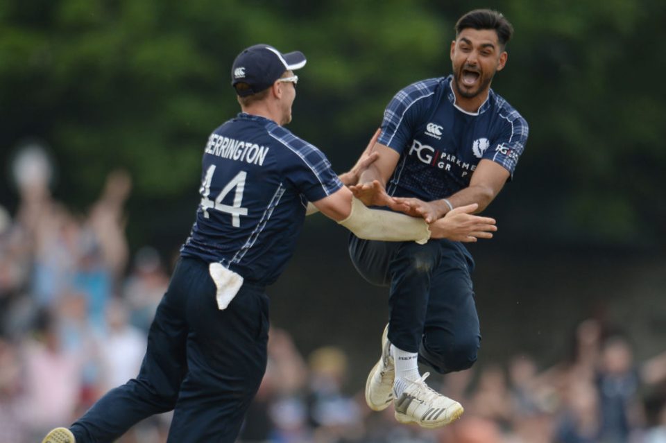 EDINBURGH, SCOTLAND - JUNE 10: Safyaan Sharif celebrates after taking the final wicket of Mark Wood as Scotland won the One-Day International match  between Scotland and England at Grange cricket club ground on June 10, 2018 in Edinburgh, Scotland. (Photo by Philip Brown/Getty Images)