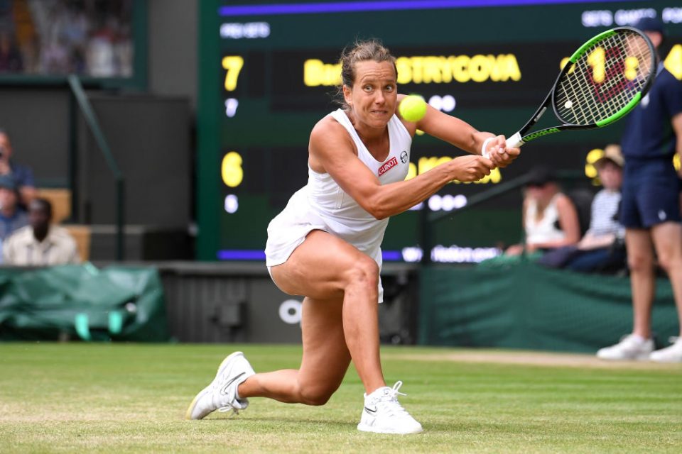 LONDON, ENGLAND - JULY 09: Barbora Strycova of Czech Republic plays a backhand in her Ladies' Singles Quarter Final match against Johanna Konta of Great Britain during Day Eight of The Championships - Wimbledon 2019 at All England Lawn Tennis and Croquet Club on July 09, 2019 in London, England. (Photo by Laurence Griffiths/Getty Images)