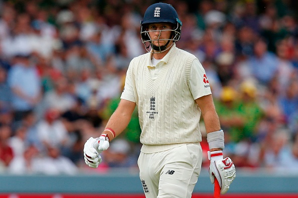 England's captain Joe Root walks back to the pavilion after losing his wicket for no runs during play on the fourth day of the second Ashes cricket Test match between England and Australia at Lord's Cricket Ground in London on August 17, 2019. (Photo by Ian KINGTON / AFP) / RESTRICTED TO EDITORIAL USE. NO ASSOCIATION WITH DIRECT COMPETITOR OF SPONSOR, PARTNER, OR SUPPLIER OF THE ECB        (Photo credit should read IAN KINGTON/AFP/Getty Images)