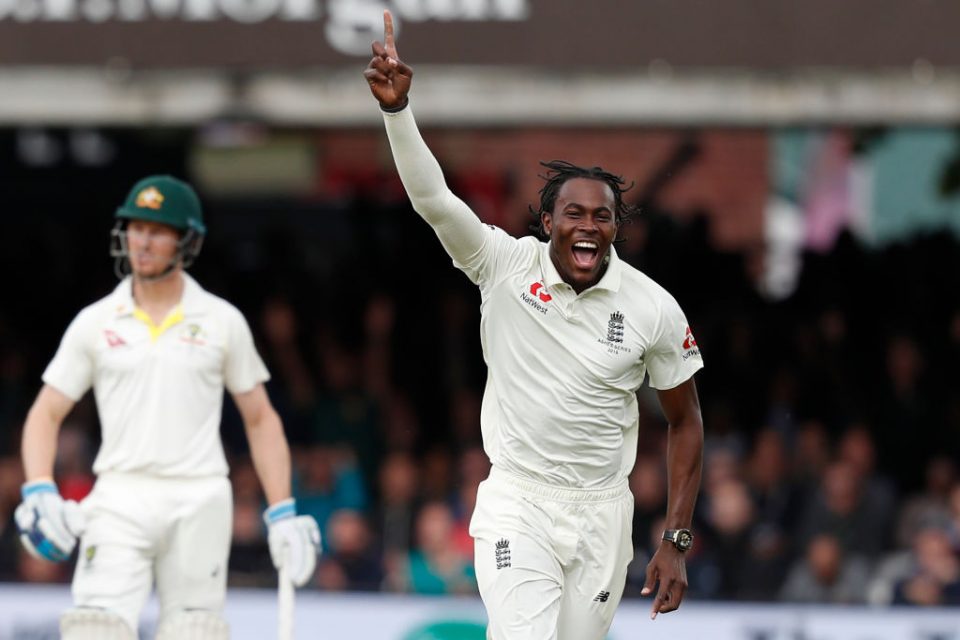 England's Jofra Archer (R) celebrates after taking the wicket of Australia's Usman Khawaja during play on the fifth day of the second Ashes cricket Test match between England and Australia at Lord's Cricket Ground in London on August 18, 2019. (Photo by Adrian DENNIS / AFP) / RESTRICTED TO EDITORIAL USE. NO ASSOCIATION WITH DIRECT COMPETITOR OF SPONSOR, PARTNER, OR SUPPLIER OF THE ECB        (Photo credit should read ADRIAN DENNIS/AFP/Getty Images)