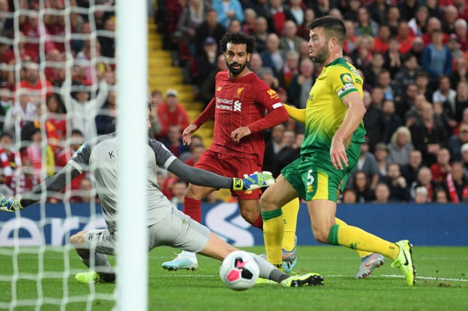 LIVERPOOL, ENGLAND - AUGUST 09: Mohamed Salah of Liverpool scores his sides second goal during the Premier League match between Liverpool FC and Norwich City at Anfield on August 09, 2019 in Liverpool, United Kingdom. (Photo by Michael Regan/Getty Images)