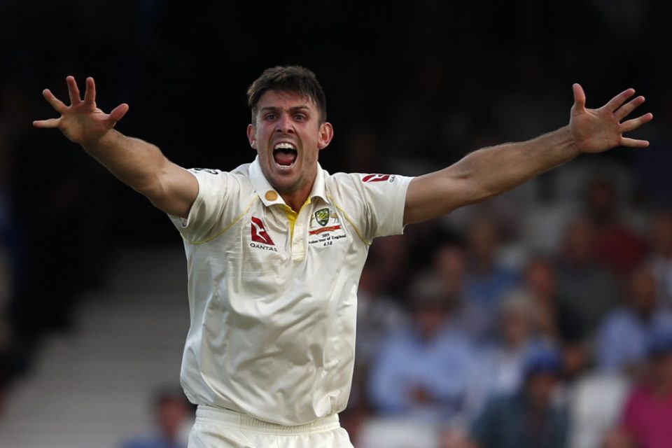 Australia's Mitchell Marsh celebrates taking the wicket of England's Chris Woakes for two during play on the first day of the fifth Ashes cricket Test match between England and Australia at The Oval in London on September 12, 2019. (Photo by Adrian DENNIS / AFP) / RESTRICTED TO EDITORIAL USE. NO ASSOCIATION WITH DIRECT COMPETITOR OF SPONSOR, PARTNER, OR SUPPLIER OF THE ECB        (Photo credit should read ADRIAN DENNIS/AFP/Getty Images)