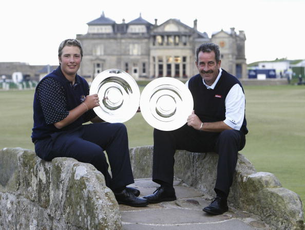 ST ANDREWS, SCOTLAND - SEPTEMBER  28:  Daniel and Sam Torrance pose with their trophies after winning the Team Competition at the Dunhill Links Championship September 28, 2003 on the Old Course, St Andrews, Scotland.  (Photo by Andrew Redington/Getty Images)