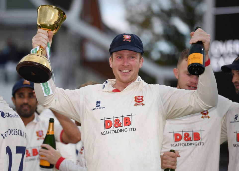 TAUNTON, ENGLAND - SEPTEMBER 26: Simon Harmer of Essex with the Specsavers County Championship Trophy  during Day Four of the Specsavers County Championship Division One match between Somerset and Essex at The Cooper Associates County Ground on September 26, 2019 in Taunton, England. (Photo by Alex Davidson/Getty Images)