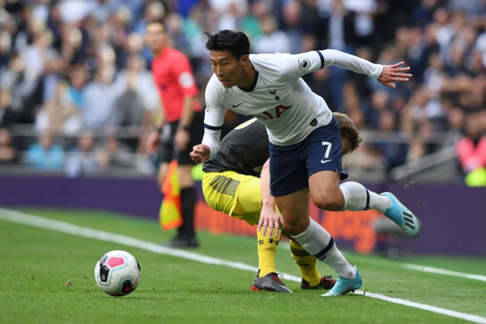 LONDON, ENGLAND - SEPTEMBER 28: Heung-Min Son of Tottenham Hotspur is challenged by James Ward-Prowse of Southampton during the Premier League match between Tottenham Hotspur and Southampton FC at Tottenham Hotspur Stadium on September 28, 2019 in London, United Kingdom. (Photo by Alex Davidson/Getty Images)