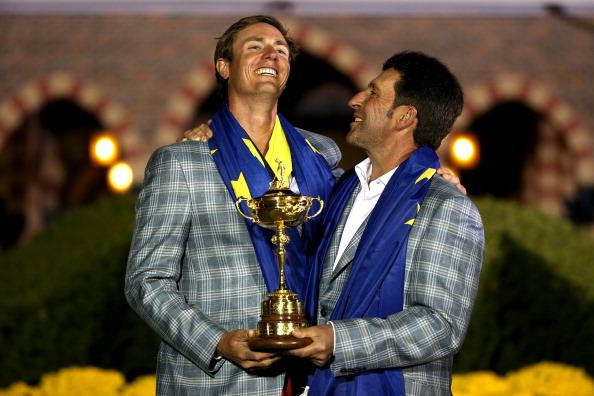 MEDINAH, IL - SEPTEMBER 30:  European team captain Jose Maria Olazabal poses with Nicolas Colsaerts and the Ryder Cup after Europe defeated the USA 14.5 to 13.5 to retain the Ryder Cup during the Singles Matches for The 39th Ryder Cup at Medinah Country Club on September 30, 2012 in Medinah, Illinois.  (Photo by Ross Kinnaird/Getty Images)