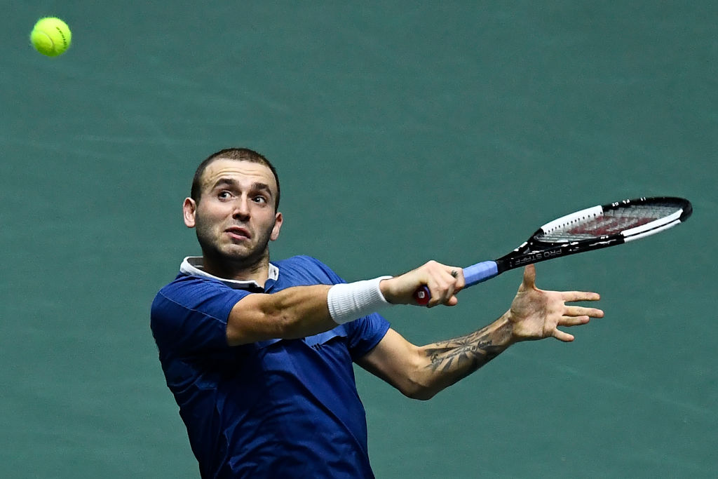 Dan Evans plays for Great Britain at the 2019 Davis Cup finals
