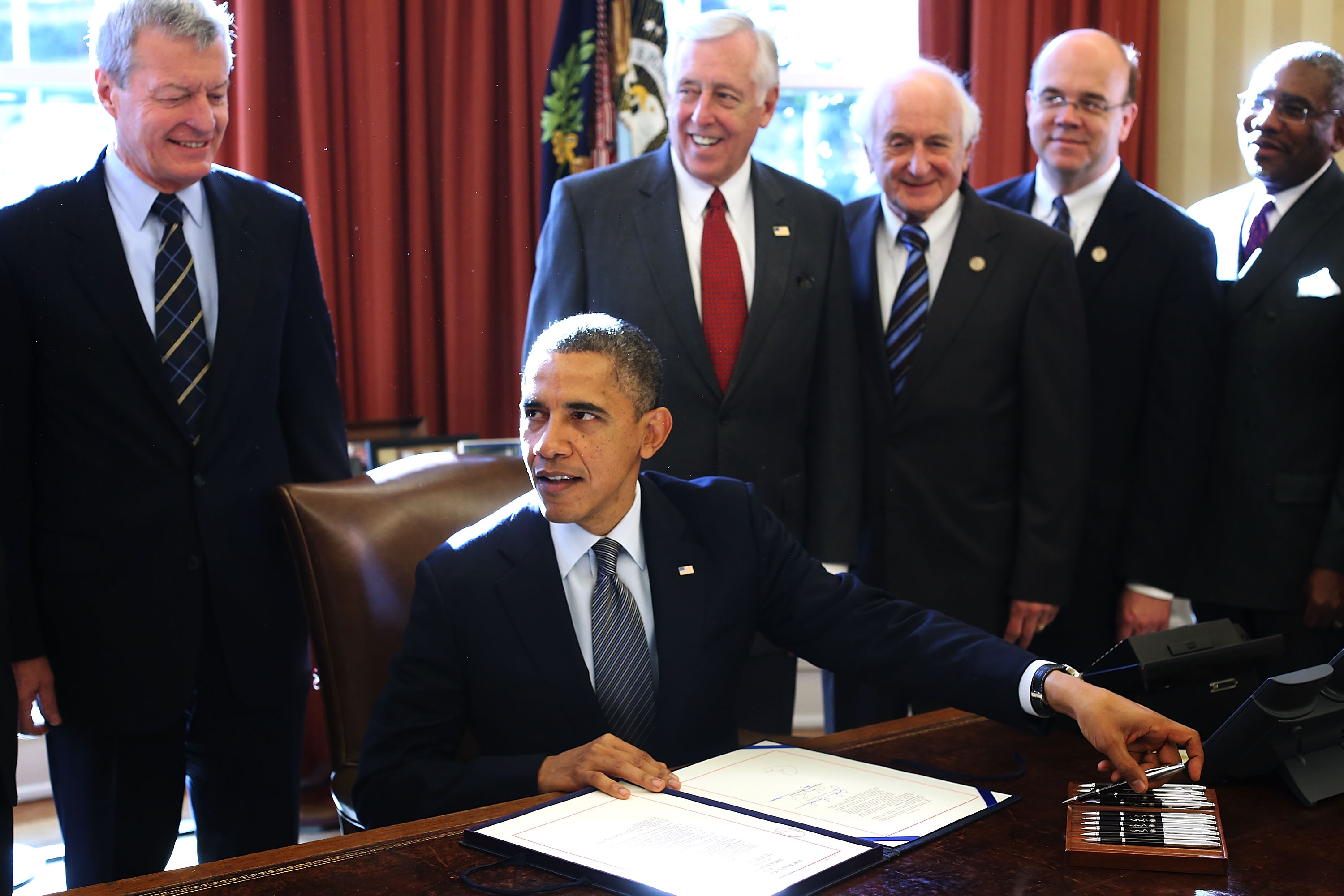 Former US President Barack Obama signed the Russia and Moldova Jackson-Vanik Repeal and Sergei Magnitsky Rule of Law Accountability Act, into law in the Oval Office on 14 December, 2012